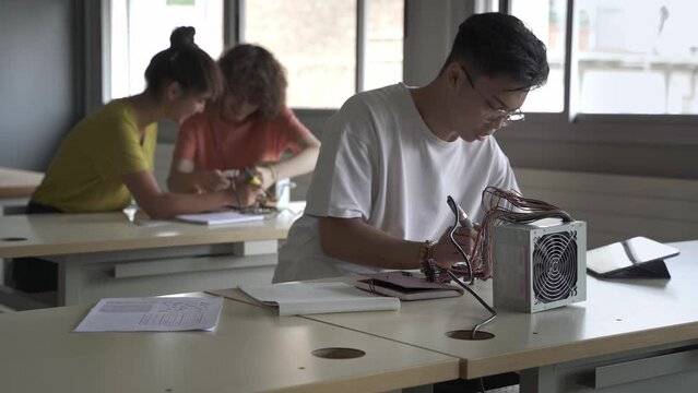 Smart Asian Student in a technology science lesson at school. 