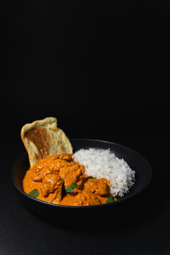 Pollo Tika Massala con arroz basmati. Comida india