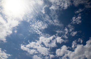 Peaceful blue sky with light clouds