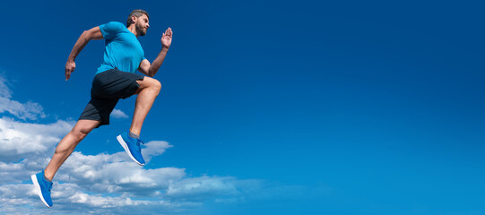 Man running and jumping, banner with copy space. muscular man running in sportswear outdoor on sky background, challenge