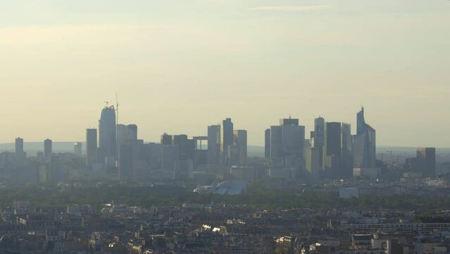 Skyscrapers of La Defense business district in Paris, France at sunset