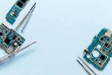 Tweezer with microchip on circuit board. Tech support or repair servise concept