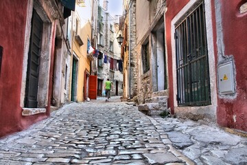 Fototapeta na wymiar Shiny stone paved street in Croatia