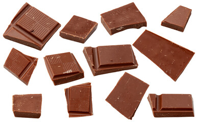 Milk chocolate. Flying pieces of milk chocolate, isolated on white background.