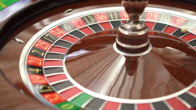 The small ball falls into the slot as the Roulette Wheel spins. High quality FullHD footage
