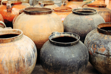 Fototapeta na wymiar Handmade old clay pots, decorative ukrainian craft ceramic