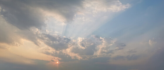 Naklejka na ściany i meble Beautiful sunset sky with some clouds