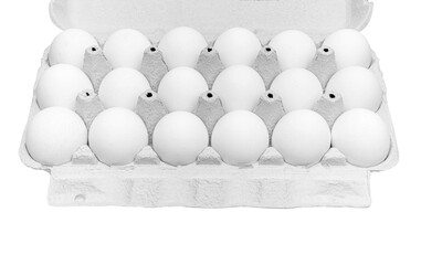 Chicken eggs in a cardboard box on a white background.