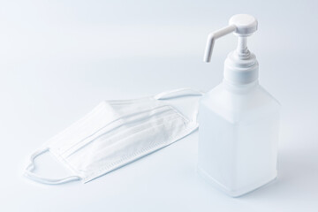 新型コロナウイルス感染症対策イメージ（手指消毒液とサージカルマスク）