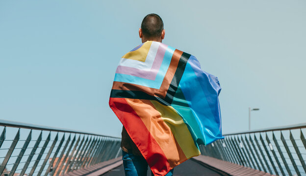 wrapped in intersex-inclusive progress pride flag