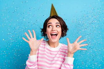 Photo of ecstatic delighted positive lady screaming in excitement birthday party isolated on blue...