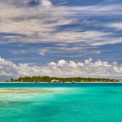 Beach of the Maldives. Tourism, travel and vacation in a luxury resort