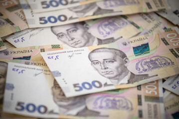 Obraz na płótnie Canvas Ukrainian hryvnia, new 500 hryvnia bills. Hryvnia UAH Financial background with hryvnia