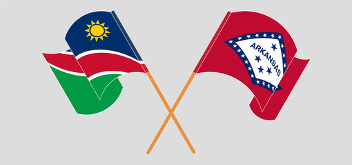 Crossed and waving flags of Namibia and The State of Arkansas