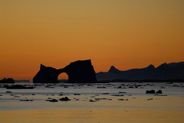 Lemaire strait coastal landscape, mountains and icebergs, Antarctic Peninsula, Antartica.