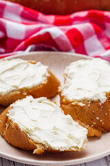 baguette cream cheese sandwich on a white background