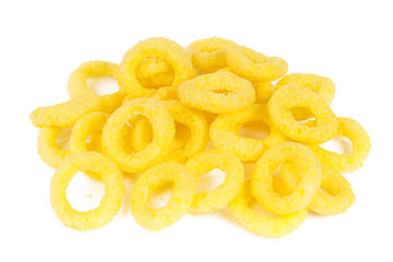 Yellow cereal rings on a white background, beer snack.