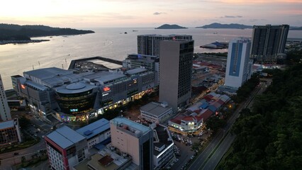 Kota Kinabalu, Sabah Malaysia – June 14, 2022: The Waterfront and Esplanade Area of Kota Kinabalu City Centre - Powered by Adobe