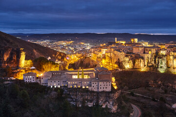 Illuminated picturesque city of Cuenca at dusk. Travel Spain