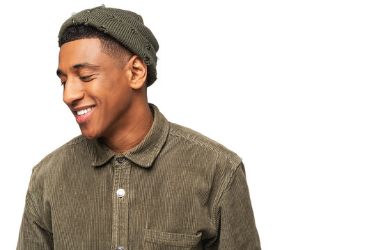 Portrait Of Happy Young African American Guy Looking Away With Pleasure Smile Isolated On White Background. Man Posing At The Studio