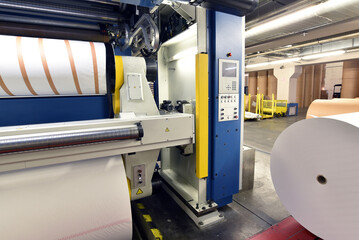 modern offset printing machines in a large printing plant - modern equipment in an industrial...
