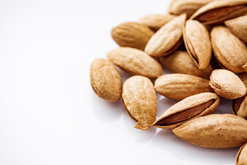 fresh almonds in shell on a white background