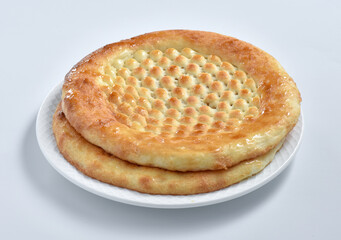 Lahori Kulcha, is a unique shape of flatbread. Popular in Lahore, Pakistan but also popular in many countries. Prepared with finest wheat flour and then coat with butter.