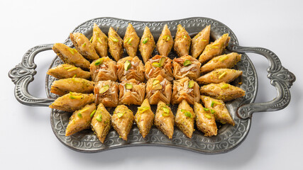 Baklava is one of the most popular sweet snacks in the world. It is born in the Mediterranean countries but is similarly famous in Turkey, the gulf peninsula and now in Pakistan.