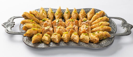 Baklava is one of the most popular sweet snacks in the world. It is born in the Mediterranean countries but is similarly famous in Turkey, the gulf peninsula and now in Pakistan.
