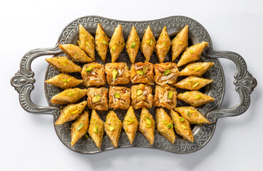 Baklava is one of the most popular sweet snacks in the world. It is born in the Mediterranean countries but is similarly famous in Turkey, the gulf peninsula and now in Pakistan.