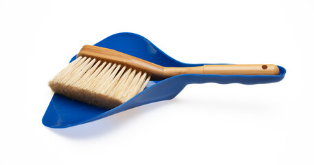 Small broom and blue dustpan isolated on white background. Brush with handle and plastic scoop set