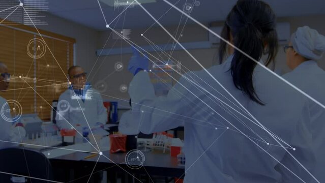 Animation of network of connections over diverse scientists talking in lab