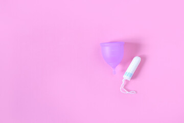 Concept of critical days, menstruation. Alternative choice is a menstrual cup or pads and tampons.