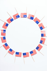 4th of July American Independence Day. Independence day frame made of Usa flag on white background. Flat lay, top view, copy space