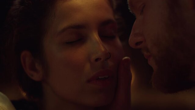 Tender couple desire love on date closeup. Sensual man hand touch woman face