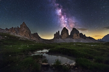 Milky Way above Tre Cime di Lavaredo mountains - obrazy, fototapety, plakaty