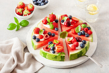 watermelon pizza slices with yogurt and berries, summer dessert - Powered by Adobe