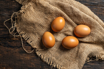 chicken eggs on a wooden table