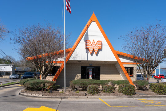 Pearland, TX, USA - March 10, 2022: A Whataburger restaurant in Pearland, TX, USA. Whataburger is an American regional fast food restaurant chain that specializes in hamburgers.
