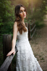 Girl near the fence.