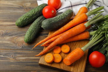 Carrot slices.Fresh carrots on brown texture background. Sliced carrot slices for salad.Vegetarian organic vegetables.Healthy food.Copy space.Place for text