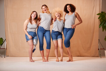 Fototapeta na wymiar Group Of Diverse Casually Dressed Women Friends One With Prosthetic Limb Promoting Body Positivity