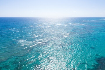 Atlantic ocean with reef and turquoise water, caribbean destinations. Aerial view