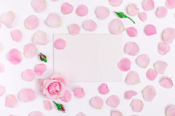 Floral roses composition with empty copy space, top view