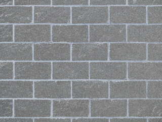 grey vintage old white alley cinder block brick wall exterior shadows retro style gray building closeup