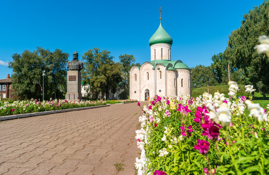 Pereslavl-Zalessky, Russia - August 18, 2020: View of Savior's Cathedral with monument to Alexander Nevsky in the square in front of the church.