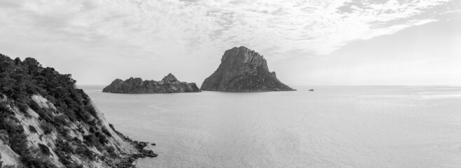 B/W view from Mirador Cala d'Hort of Cap Blanc and 2 magnetic islands - small Isla de es Vedranell...
