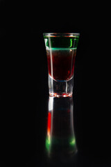 Layered cocktail. on a dark background.