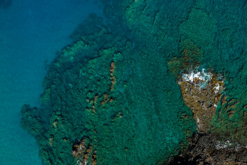 Fototapeta na wymiar Drone shot of ocean off the coast of Kona, Hawaii