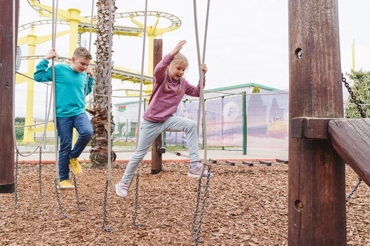 Children in the park on the playground.